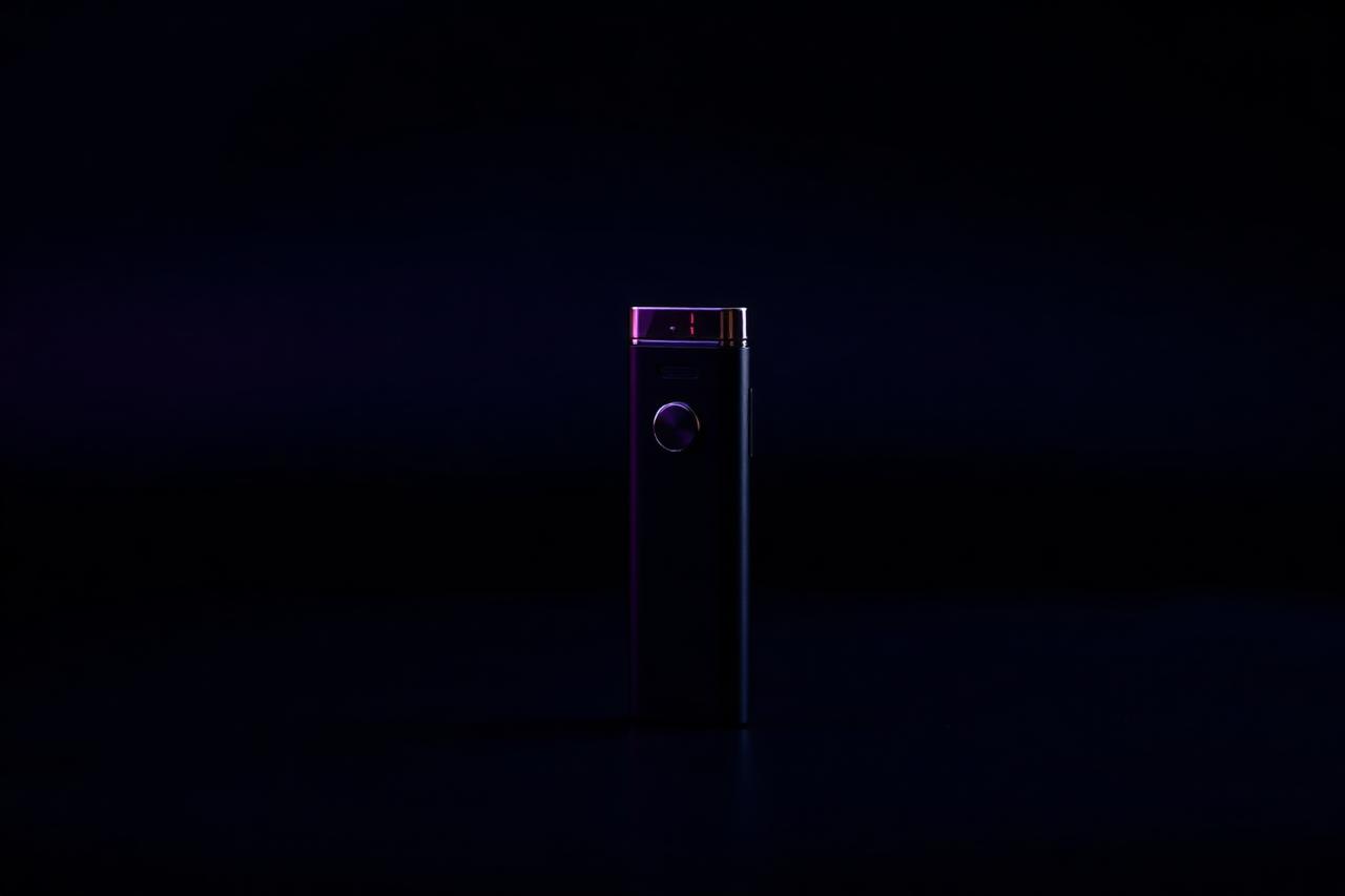 Boutiq V5 2g triple-chamber disposable vape standing upright with its strain selector wheel visible