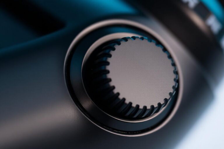 Close-up macro of the Boutiq Switch V5 rotating chamber selector between positions one and two